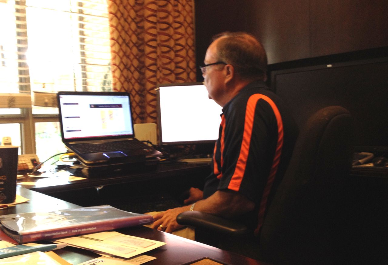Don Hooton reviews data about teenage steroid use in his home office in McKinney, Texas.
