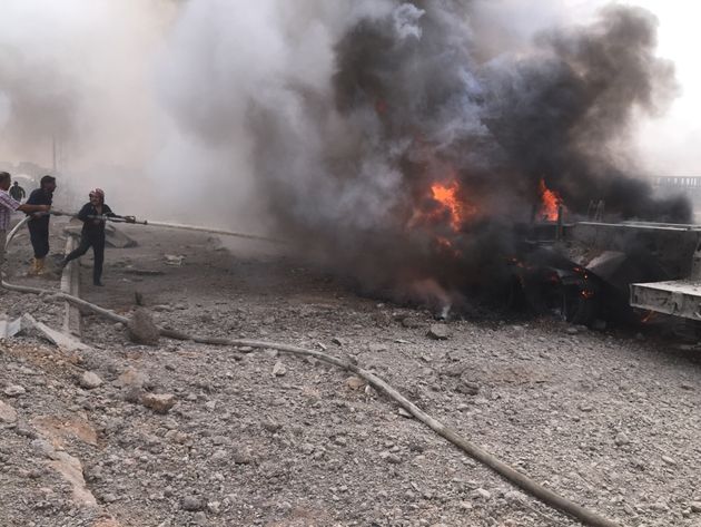 <span class='image-component__caption' itemprop="caption">Firefighters extinguish the fire after a car bomb attack on YPG headquarters in Hasakah, Syria on September 15, 2015. At least nine people were killed and other 30 people wounded after the attack.</span>