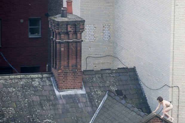  <i>A witness captures Jackson's precarious performance from above.</i>