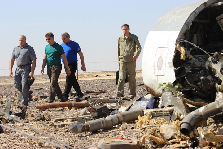 British and U.S. spies intercepted "chatter" from suspected militants that a bomb downed a Russian airliner on Saturday,