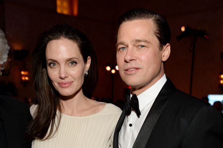 HOLLYWOOD, CA - NOVEMBER 05: Writer-director-producer-actress Angelina Jolie Pitt (L) and actor-producer Brad Pitt attend the after party for the opening night gala premiere of Universal Pictures' 'By the Sea' during AFI FEST 2015 presented by Audi at TCL Chinese 6 Theatres on November 5, 2015 in Hollywood, California. (Photo by Michael Kovac/Getty Images for AFI)