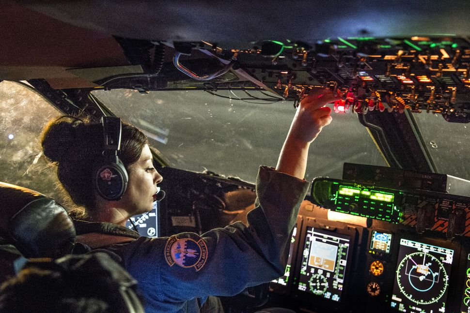 1st Lt. Meaghan Cosand, C-5B Galaxy pilot with the 312th Airlift Squadron, starts engines in preparation for takeoff from Kad