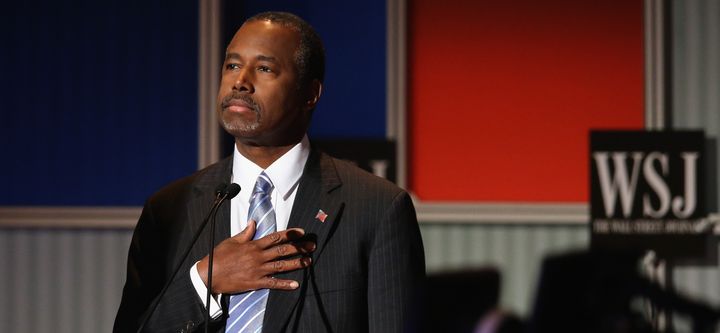 Presidential candidate Ben Carson pauses during the Star Spangled Banner in the opening of the Republican Presidential Debate sponsored by Fox Business and the Wall Street Journal at the Milwaukee Theatre November 10, 2015 in Milwaukee, Wisconsin. 