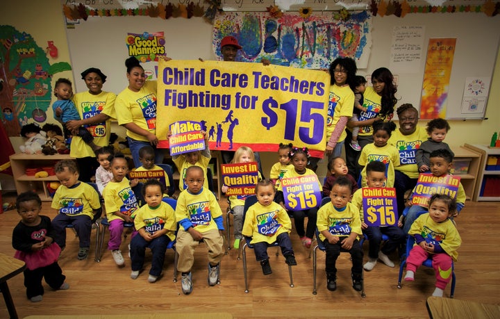 Child care workers and children at Ubuntu Academy and Early Learning Center in Kansas City, Missouri, call for a $15 per hour minimum wage.