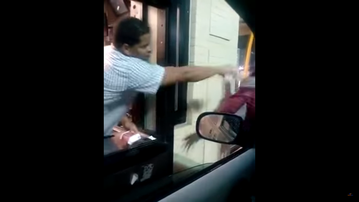 Just when the man comes within reach, the unidentified employee is seen splashing a cup of water on him to the amusement of a