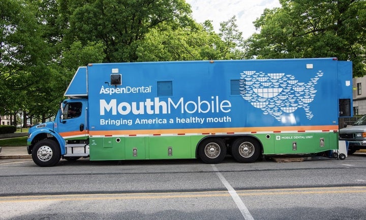 Through its Healthy Mouth Movement program, Aspen Dental dispenses a mobile dental unit through about 30 states to serve veterans in need. 