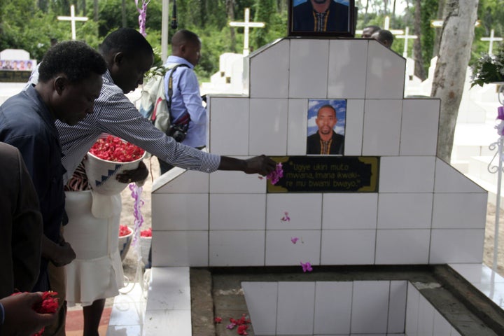 Mourners attend the funeral of Mbonimpa's son, Welly Nzitonda, in Bujumbura, the capital of Burundi, on Tuesday.