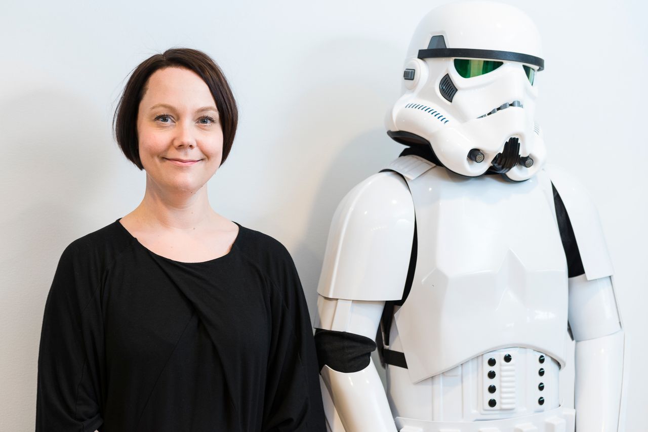 Sigurlina Ingvarsdottir, lead producer of "Star Wars Battlefront," chills with an Imperial stormtrooper.