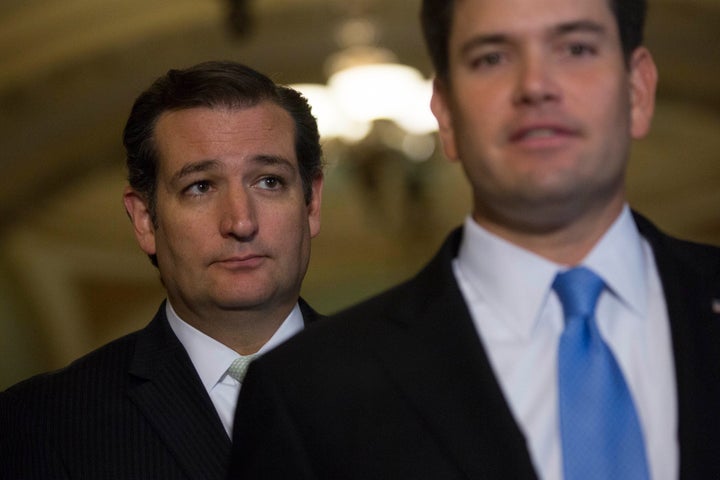 Sen. Ted Cruz (R-Texas), left, has criticized Sen. Marco Rubio (R-Fla.) over immigration as they compete for the Republican p