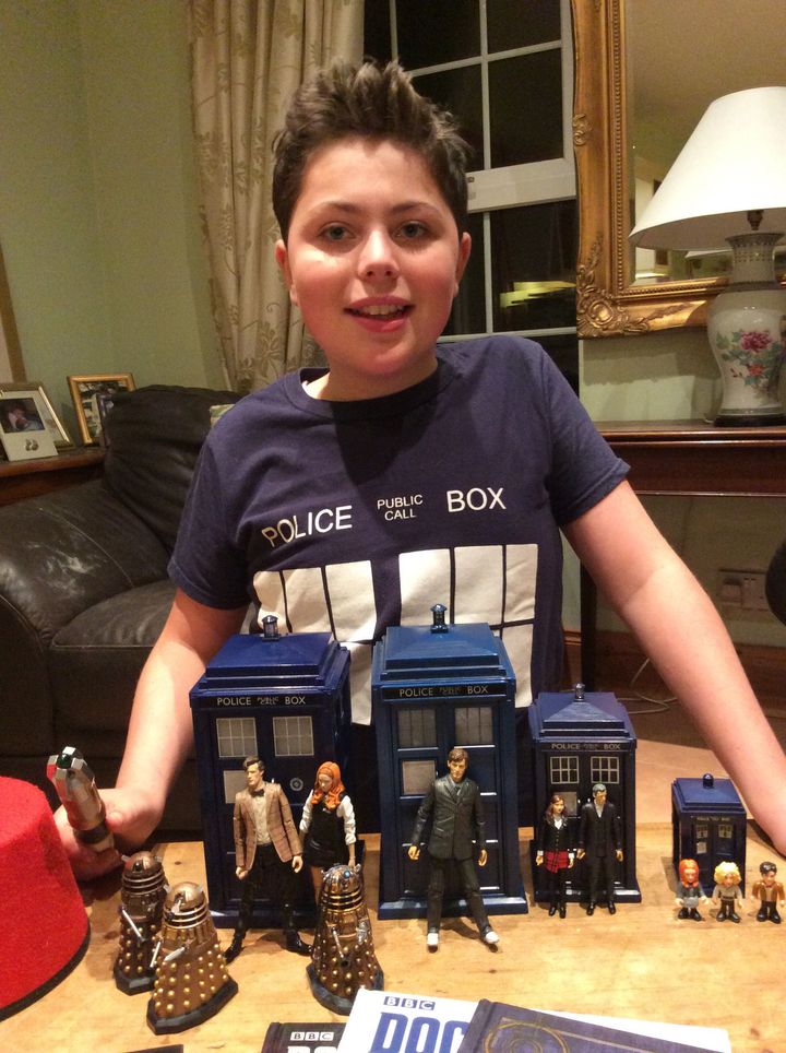 Rory displays his impressive Dr. Who toy collection.