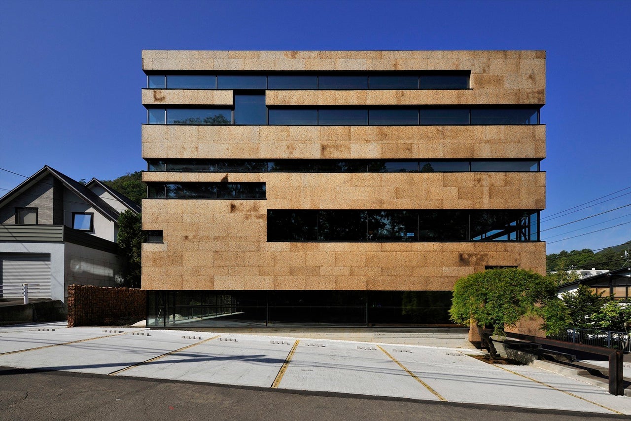 A completed office building in Sapporo, Hokkaido, in Japan that blends natural materials with minimalist style.