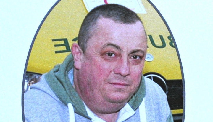 A photo of Alan Henning is seen on a handout for his memorial service in 2014.