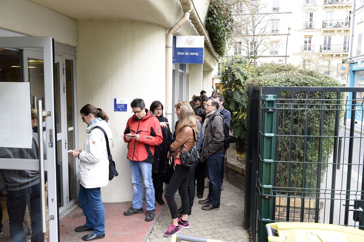 People line up to donate blood at a blood bank in Paris on Nov. 14, 2015.