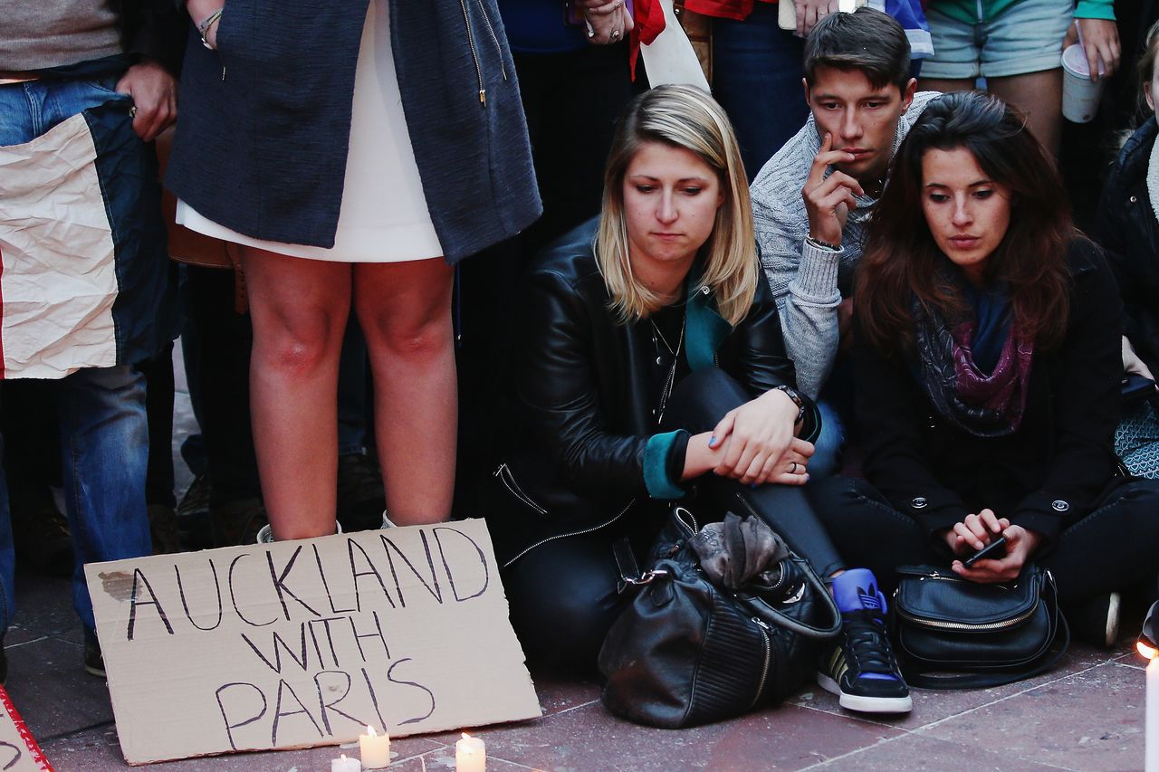 People gather during a vigil in Aotea Square on Nov. 14, 2015 in Auckland, New Zealand, to remember victims of the Paris attacks.