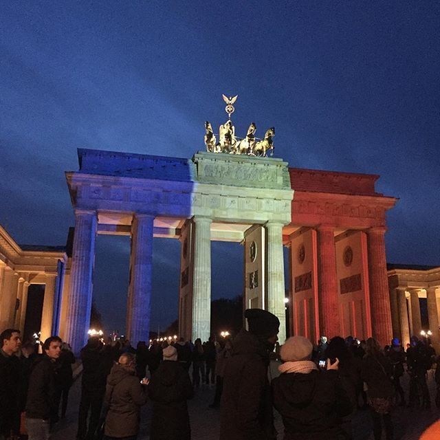 The Brandenburg Gate is lit in solidarity with Paris on Saturday, Nov. 14, 2015, in Berlin, Germany.