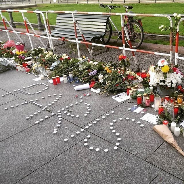 Flowers left outside the French Embassy in Berlin, Germany on Saturday, Nov. 14, 2015.