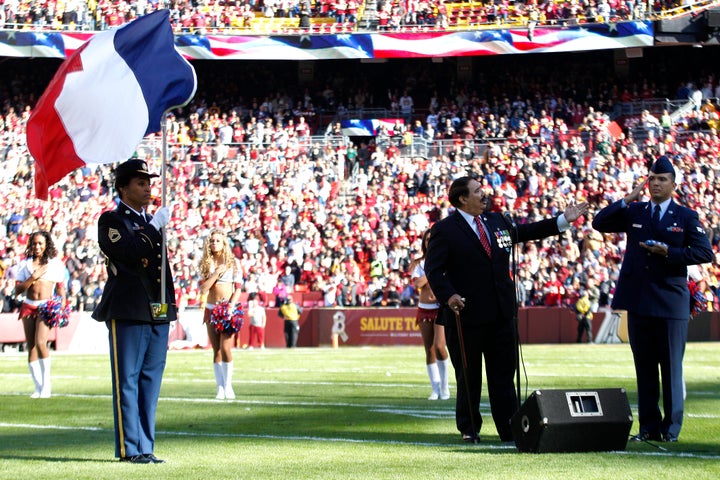 Pre-game rituals at FedExField in Landover, Maryland, incorporated the French flag before the Washington NFL team and the New Orleans Saints played each other.