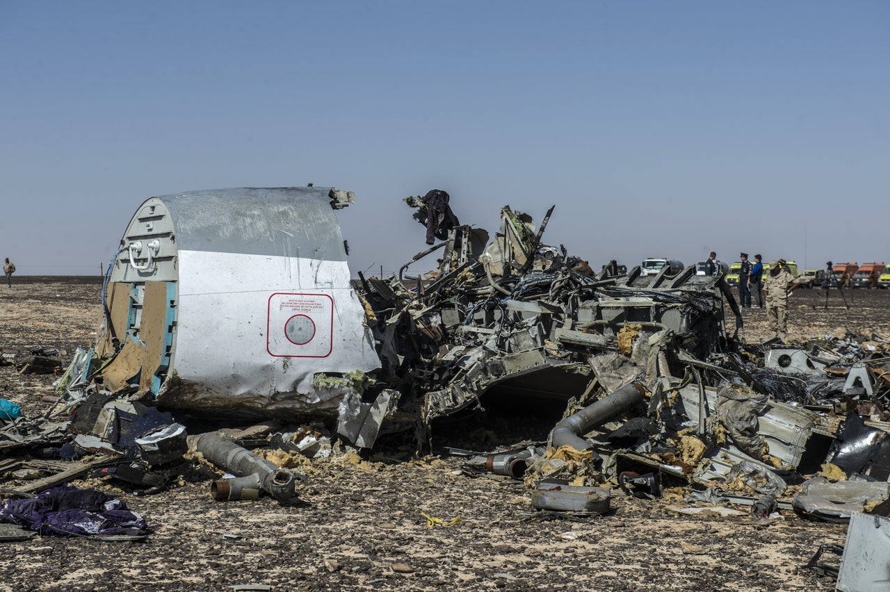 Debris of the A321 Russian airliner lie on the ground a day after the plane crashed in Wadi al-Zolomat, a mountainous area in Egypt's Sinai Peninsula, on November 1, 2015. International investigators began probing why the Russian airliner carrying 224 people crashed in the Sinai Peninsula, killing everyone on board, as rescue workers widened their search for missing victims.