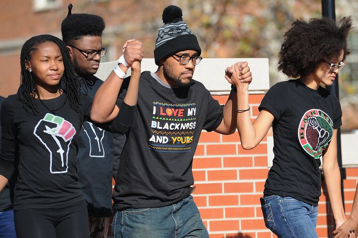 Jonathan Butler, a University of Missouri grad student who did a seven-day hunger strike, is greeted by a crowd of students on Nov. 9, 2015.