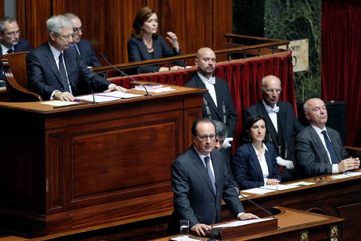 French President Francois Hollande delivers a speech during an exceptional joint gathering of both of the French houses of pa