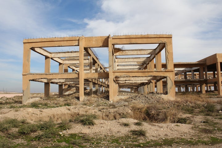 The building where Yazidi women say they were kept while their friends and family members were slaughtered outside, later thr