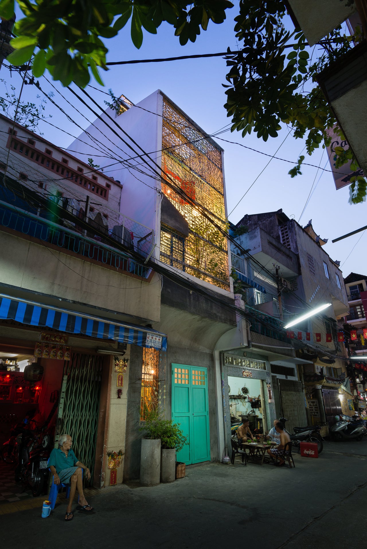 In Ho Chi Minh City, a tribute to Saigon, which includes stacked compartments with varying degrees of exposure to the outdoors.