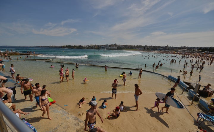 People enjoy the hot weather at Bondi Beach during the Labour Day holiday in Sydney in October 2015.