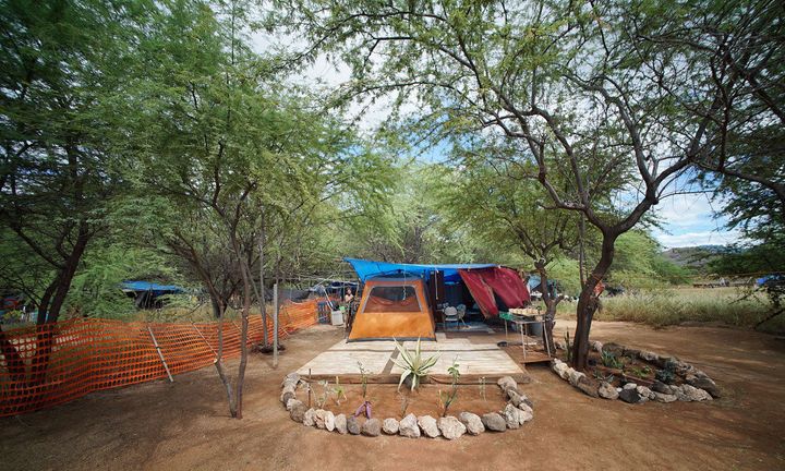 The residents of this camp moved to the site just two months ago. They’ve spent hundreds of hours making it a home, including adding a bathroom area.