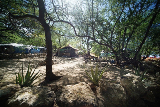 Residents try to keep space around their camp sites. Many are well kept and even have gardens.