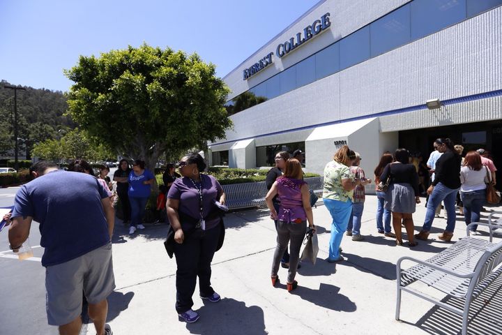 Teachers line up to enter for a meeting and opportunity to collect their personal items at Everest College in City of Industry, one of the Corinthian Colleges that closed on Monday. April 27, 2015. (Al Seib / Los Angeles Times via Getty Images)