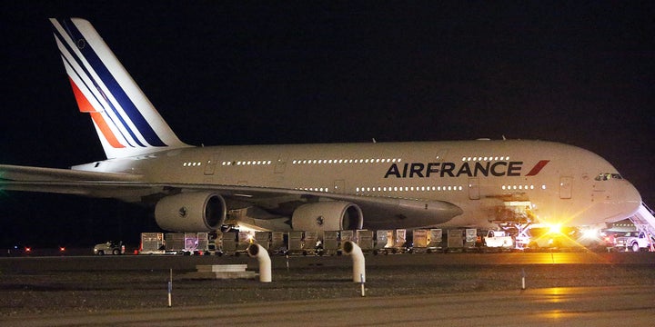 An Air France plane sits on the tarmac after it was diverted to Salt Lake City International Airport, Tuesday, Nov. 17, 2015, in Salt Lake City.