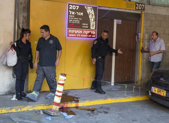 A Palestinian attacker fatally stabbed two people in a Tel Aviv office building on Thursday.
