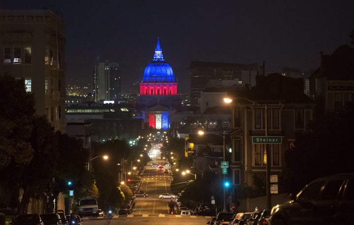 San Francisco's City Hall is illuminated in blue, white and red on November 14, 2015, one day after the Paris terrorist attacks.