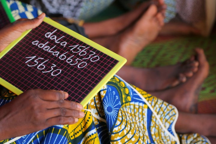 While she can write little more than her name and the French alphabet, Fati's speaking skills are improving.