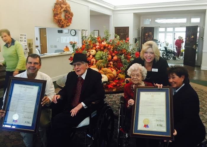 Allan and Margaret Little receiving a state proclamation in honor of their 100th birthdays. 