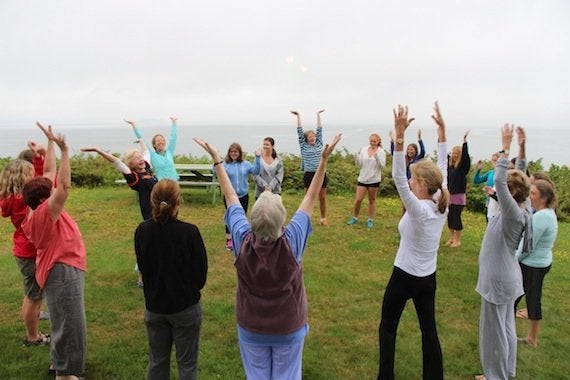 Jeannette Sanger leads a class in laughter yoga.