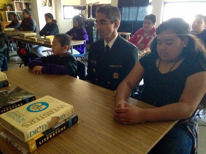 U.S. Surgeon General Vivek Murthy meditates with students in San Francisco, Calif.