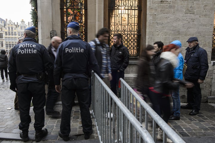 Police check people entering the Brussels Grand Place on November 20, 2015. Belgium's national security council and the government decided to deploy more police and soldiers in the streets after the November 13 attacks in Paris.