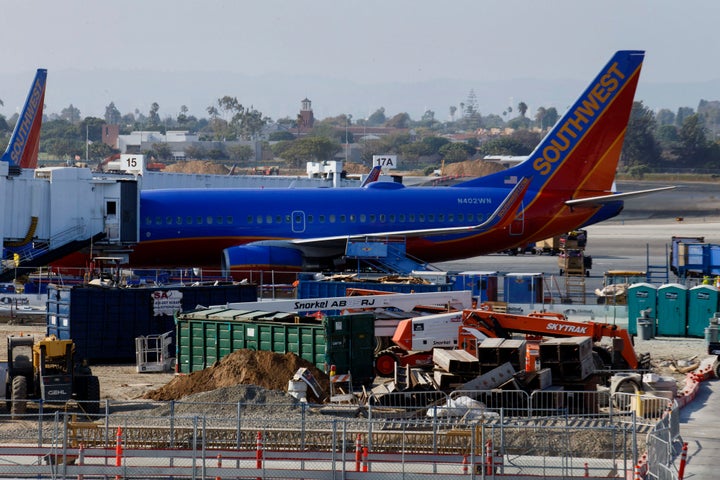 Two men were reportedly blocked from boarding a Southwest flight after another passenger overheard them speaking Arabic and said they didn't feel safe flying with them.