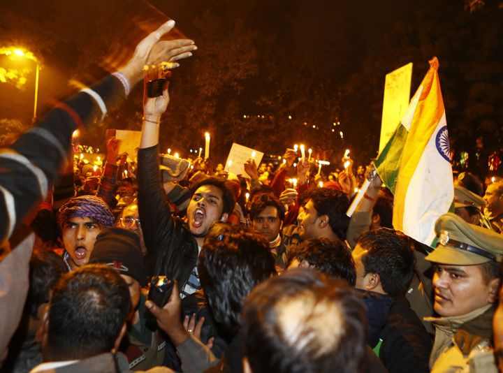 Protesters shout slogans during a rally in New Delhi on Dec. 30, 2012, following the cremation of a 23-year-old student who died after being gang raped on a moving bus.