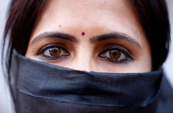 A woman at a silent protest on Dec. 21, 2012, in Kolkata, India.