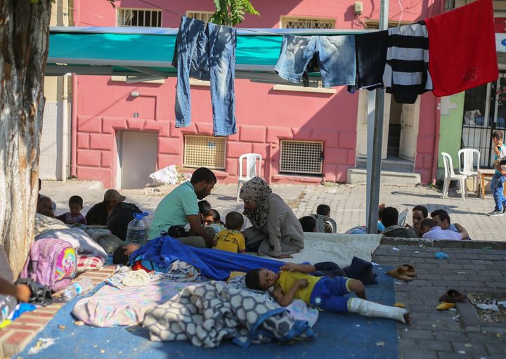 Hundreds of refugees from Turkey, Jordan and Lebanon are expected to arrive in Canada. A Syrian family is seen having lunch on the streets of Turkey in September after escaping their home country.