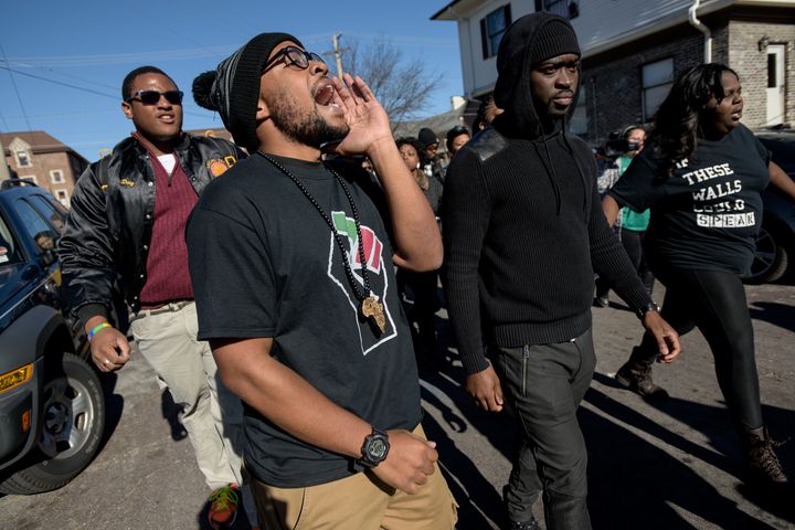 Jonathan Butler, one of the 'Original 11' organizers of the protests and the student whose hunger strike led to the resignation of Tim Wolfe, walks alongside Concerned Student 1950 group supporters during a march through University of Missouri campus on November 13, in Columbia, Missouri. The 'We Are Not Afraid' March started near Black Culture Center and ended in the central building, Jesse Hall.