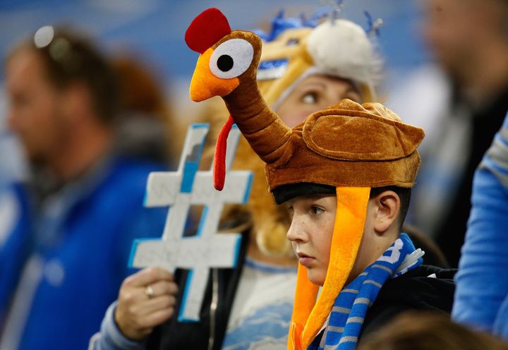 A young fan with a turkey hat looks on during the Thanksgiving day game between the Lions and the Bears at Ford Field on Nov. 27, 2014, in Detroit, Michigan.
