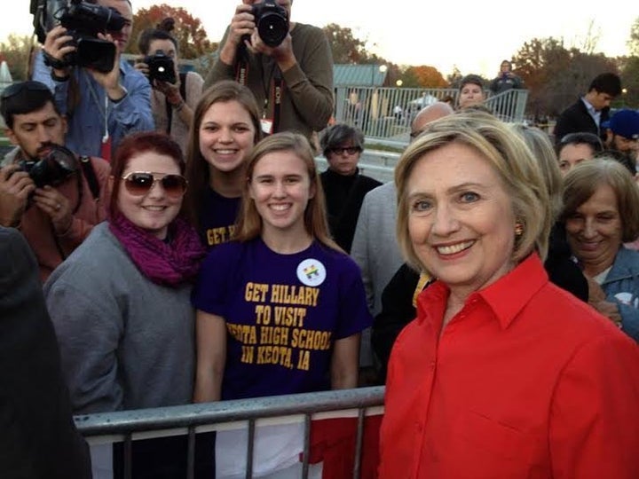 Abby Schulte, Megan Adam and Kylea Tinneas pose with Hillary Clinton following a campaign event in Coralville, Iowa, on Nov. 3, 2015.