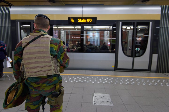Troops remain on guard around the city. Police are still hunting for a local man who is a prime suspect in the Paris attacks,