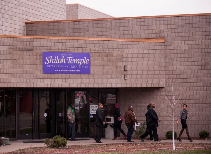 Attendees exit the funeral service of Jamar Clark at Shiloh Temple on November 25, 2015 in Minneapolis, Minnesota.