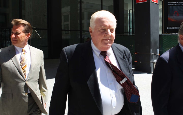 Former Chicago Police Cmdr. Jon Burge walks with members of his legal team into the Dirksen U.S. Courthouse, Monday, Jun. 28,