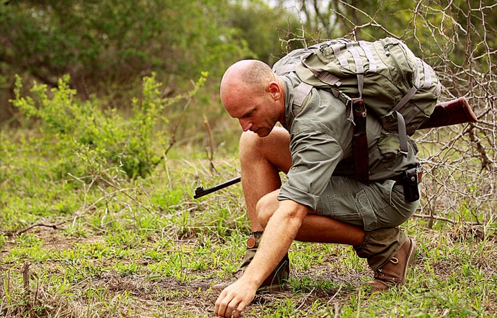 Bush walks offer viewers a unique experience from the ground, but guides can find themselves in dangerous situations. Some carry rifles in case of emergency.