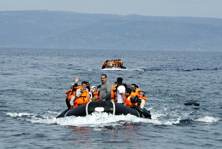Refugees, hoping to cross into Europe, arrive at the shore of Lesbos Island, Greece, on Nov. 24, 2015. Over 3,500 refuge